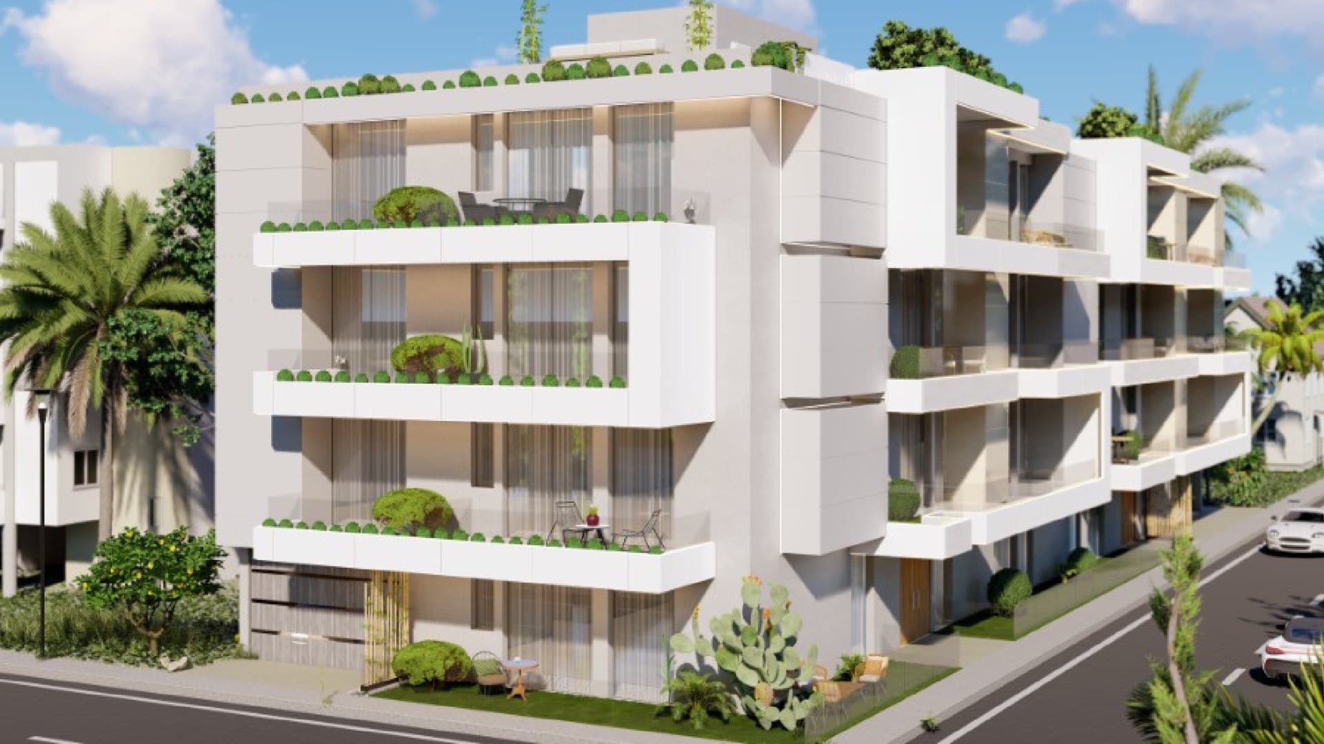 Cora Residences white seaside apartment buildings